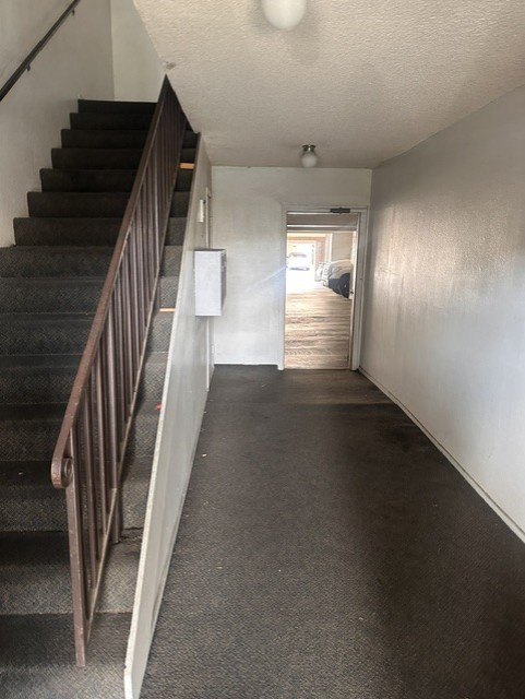 24315 Walnut St &mdash; interior stairwell connecting the garage to the upper floor